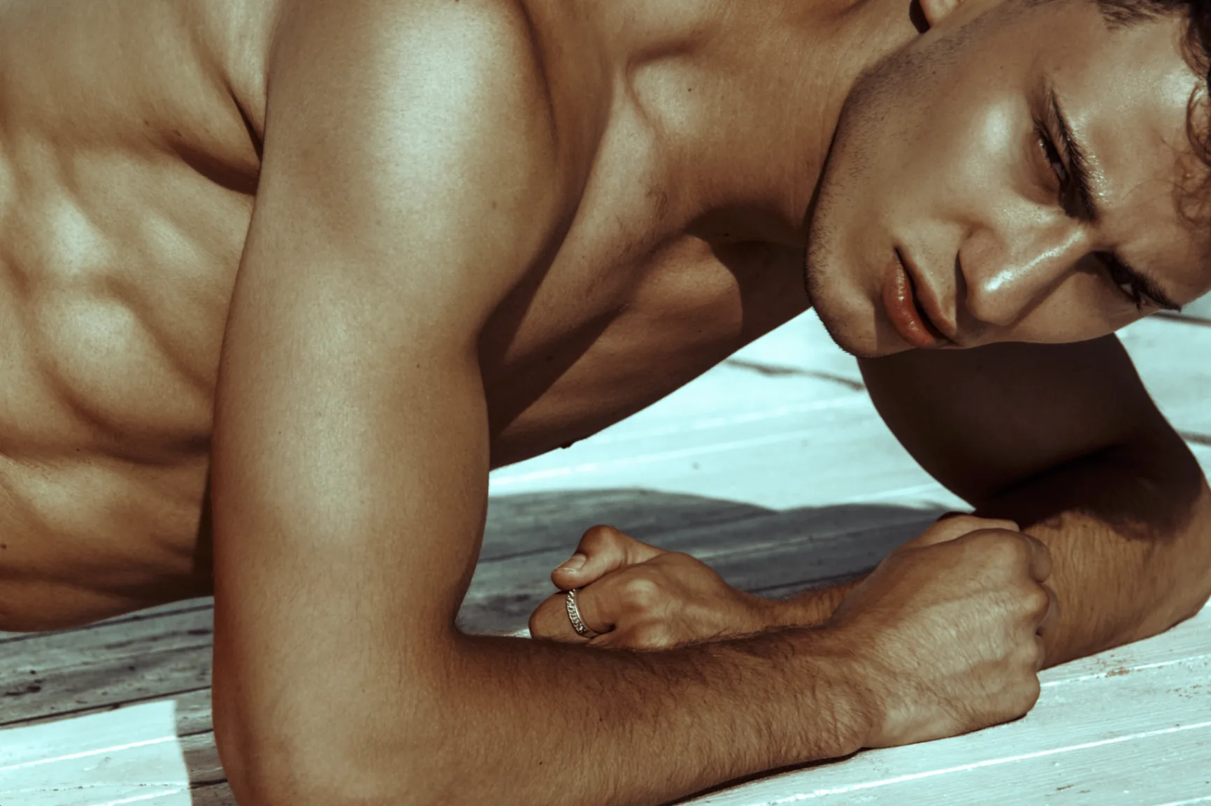 Professional male massage therapist performing bodywork